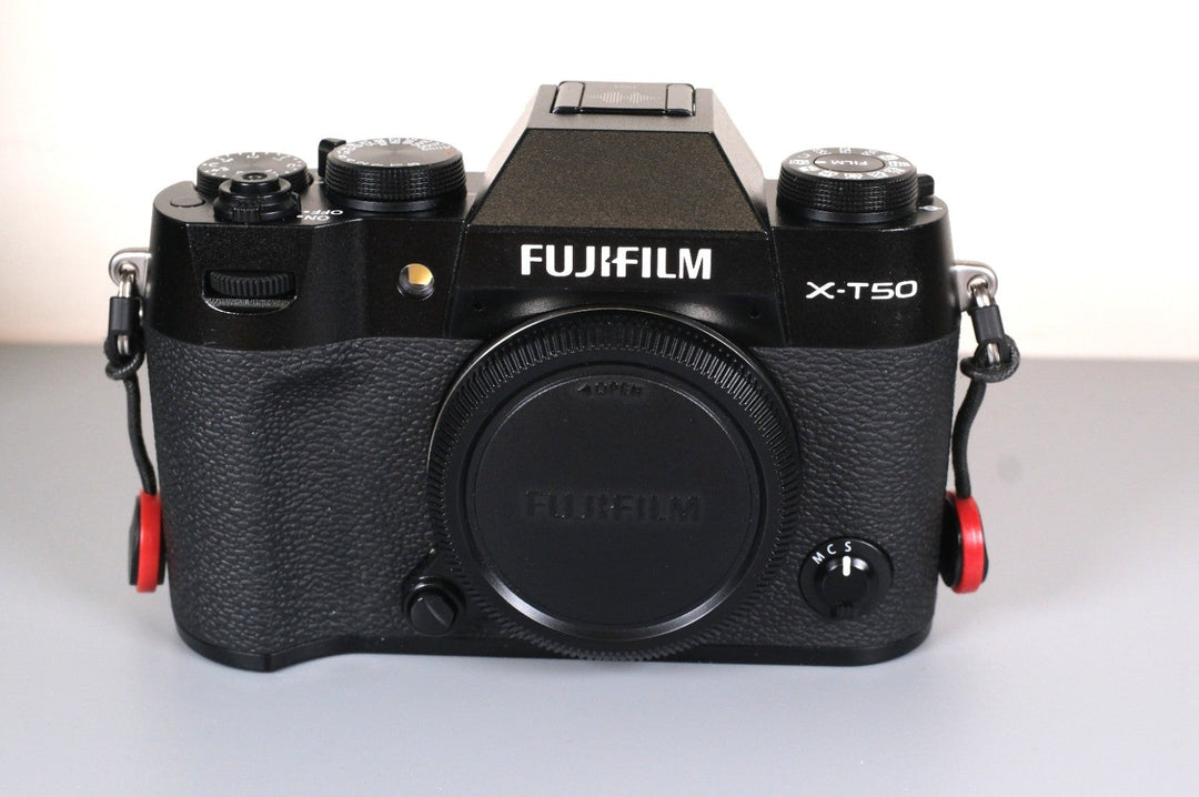 Fujifilm X-T50 Mirrorless Camera with Extras (Grip, Wrist Strap, and Flash)