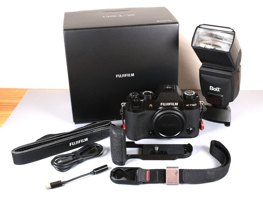 Fujifilm X-T50 Mirrorless Camera with Extras (Grip, Wrist Strap, and Flash)